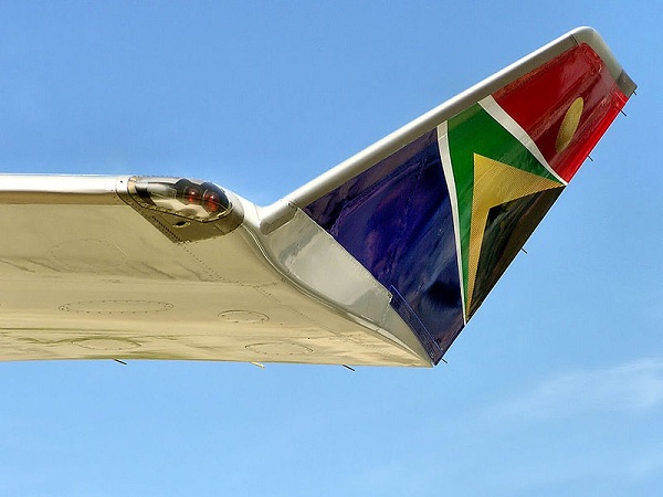  The winglet and red navigation light on the port (left) wing of a South African Airways Boeing 747-400 aircraft. 